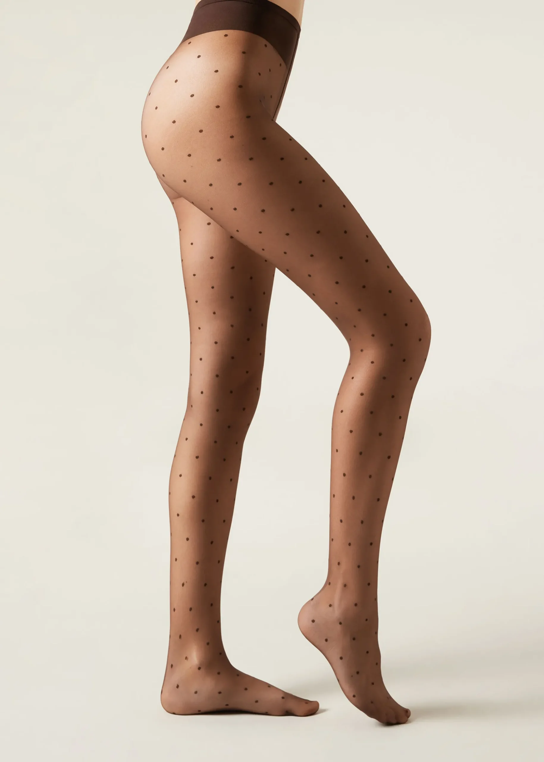 Przezroczyste rajstopy w groszki